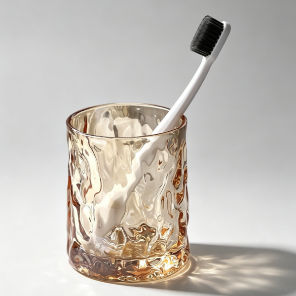 Clear glass toothbrush and toothpaste holder, brown